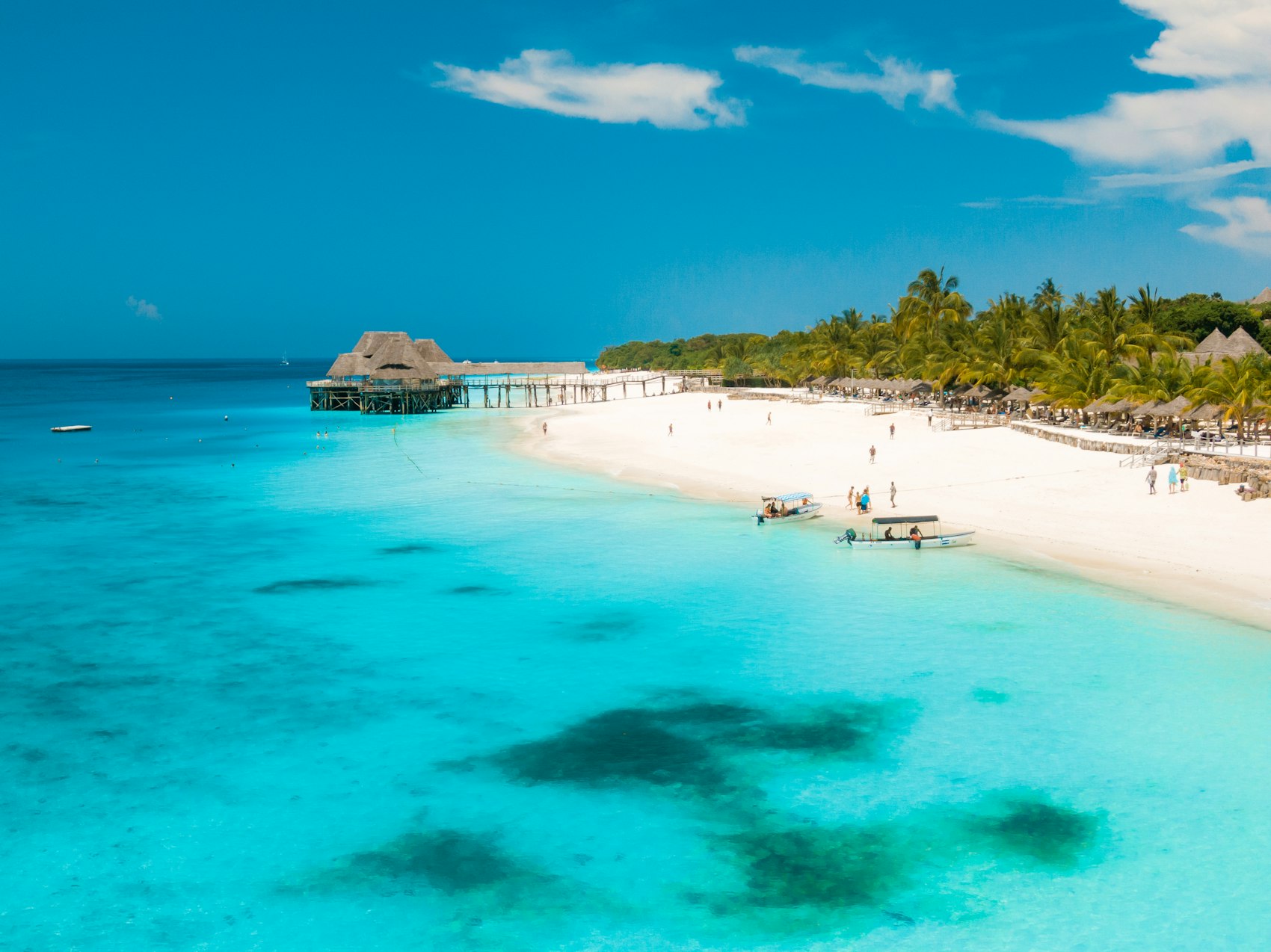 Clear shallow water over white sand
